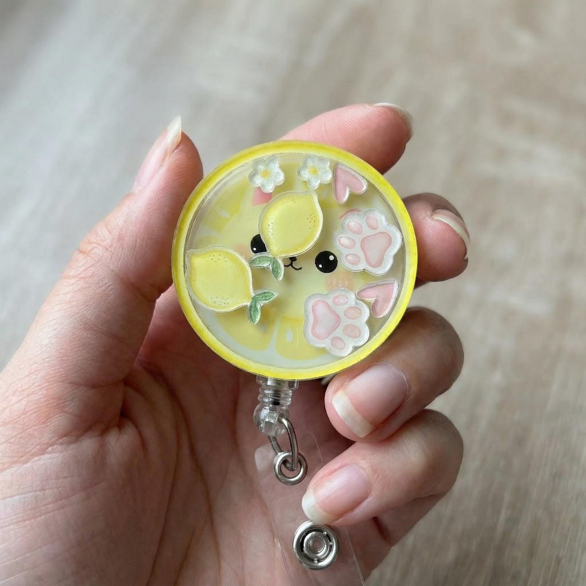 Lemon Cat Shaker Badge Reel