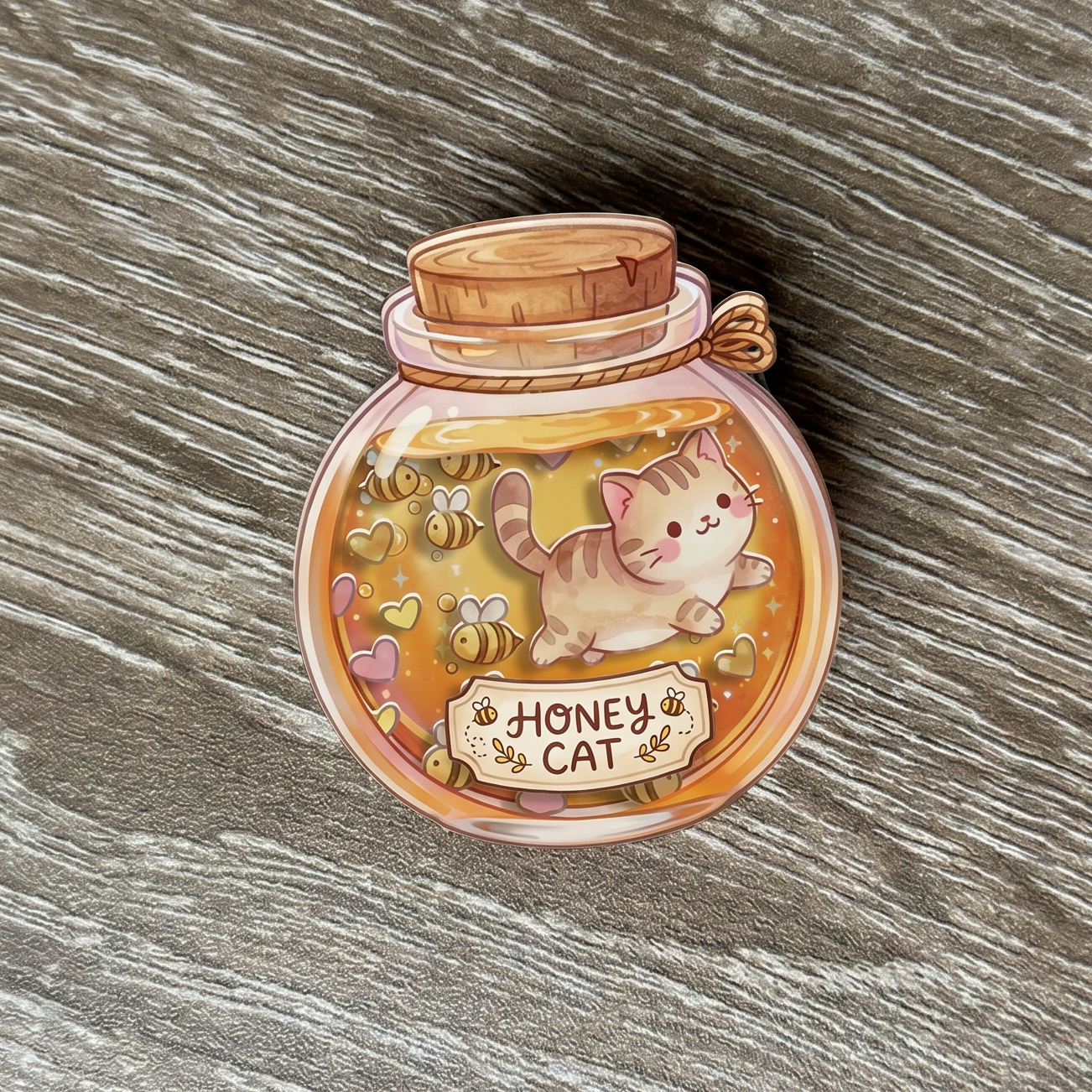 Shaker Phone Grip Stand of a cat inside a honey jar on a wooden surface